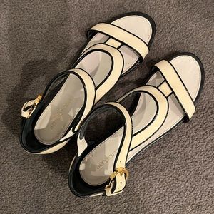Sergio Rossi flat sandal.  Excellent condition. Cream w black trim, gold buckle.